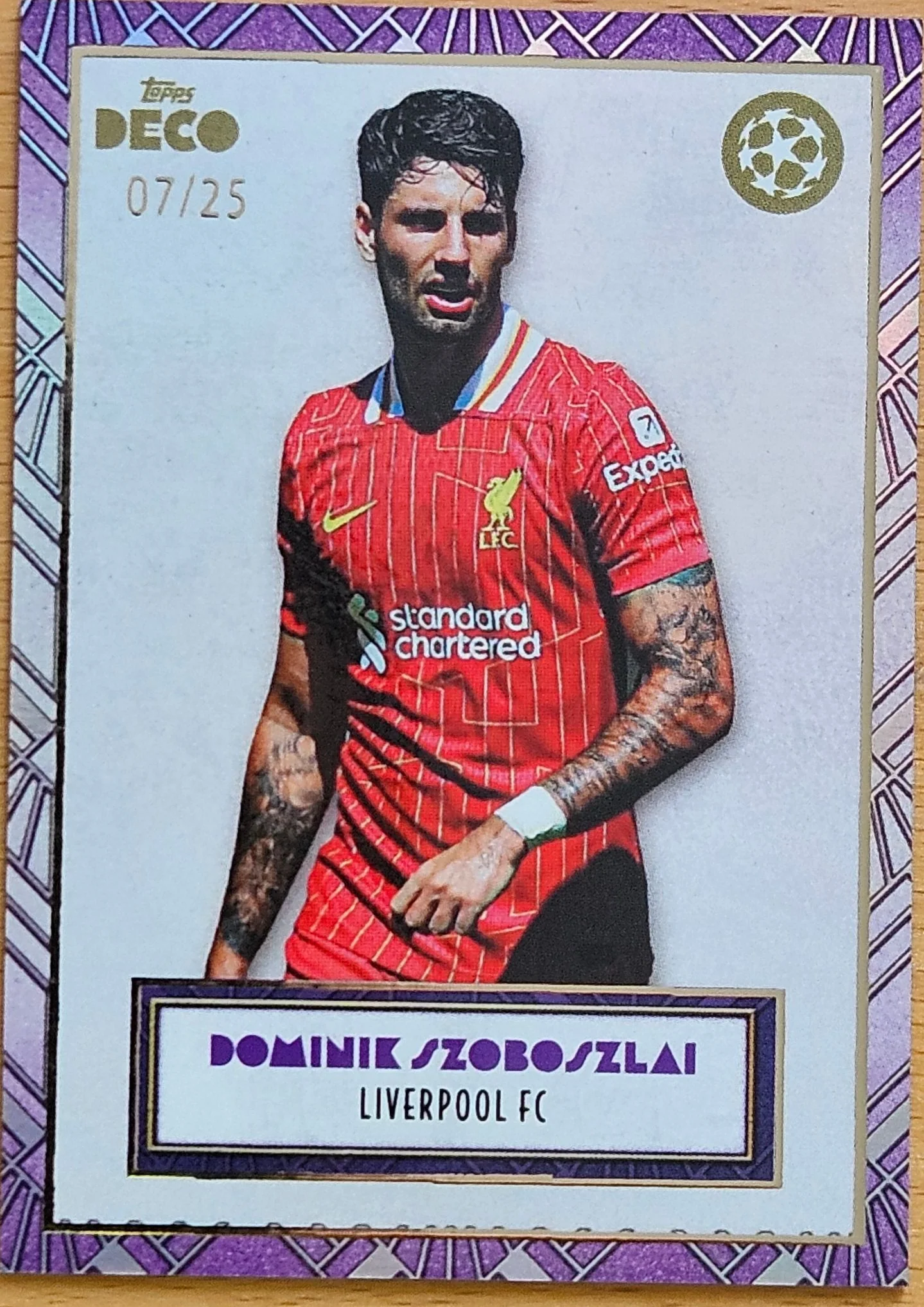 front of Dominik Szoboszlai's Topps Deco UEFA Champions League card at high resolution