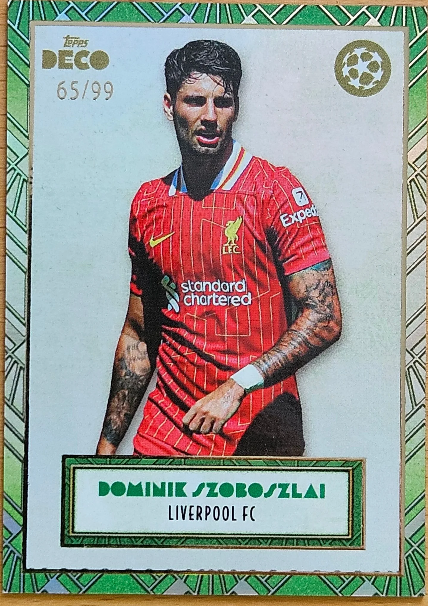 front of Dominik Szoboszlai's Topps Deco UEFA Champions League card at high resolution
